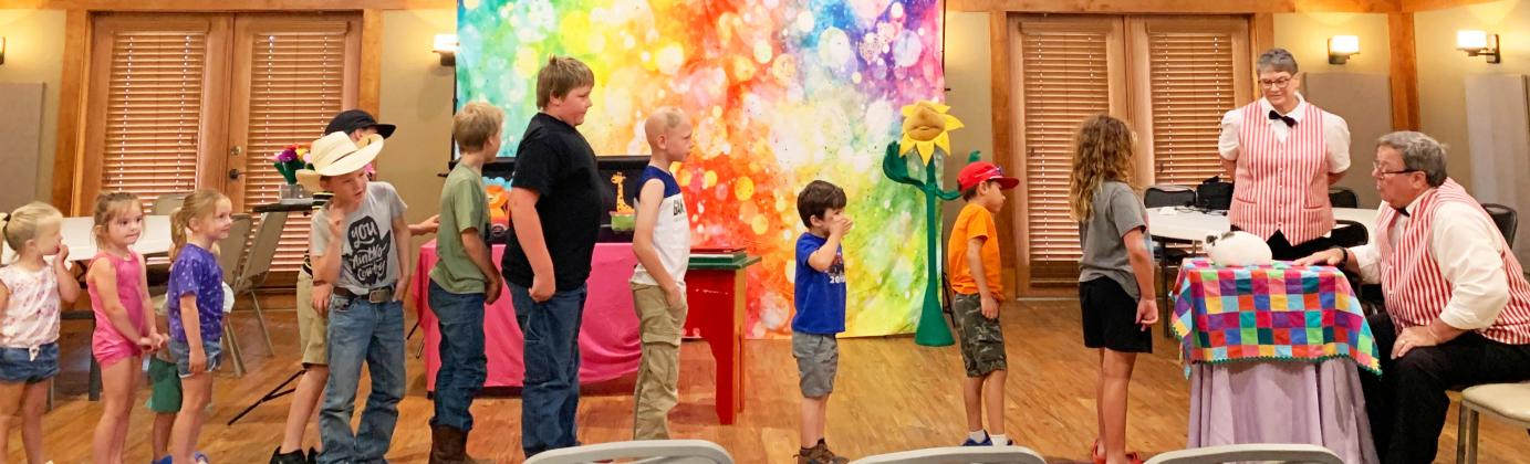 LIBRARY MAGIC The Post Public Library held a special event with“Rick the Magician”during the summer reading program at the Heritage House last Tuesday. Students enjoyed the magic tricks, Bruiser the bunny, and balloon animals. | POST DISPATCH