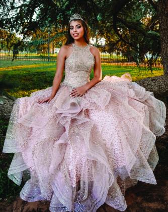Kailyn J. Collazo, daughter of Adrian and Susan Collazo was recently honored at her Quinceanera. Jaime and Diane Zubia are Kailyn’s God Parents. Photo by N&amp;amp;N Photography