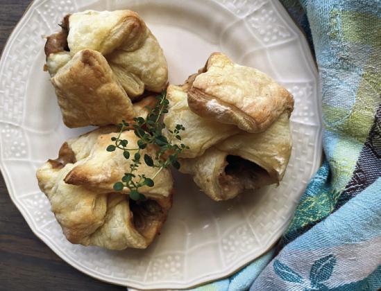MINI MUSHROOM POT PIES are a delightful culinary experience that combines comfort and gourmet flair. These pastries are filled with a savory taste of mushrooms, a creamy sauce, and fresh herbs. Creating a flavorful bite in every bite. Perfect as an appetizer or a main dish, they are easily shareable and add a touch of elegance to any meal. Plus, they are a fantastic way to enjoy vegetables. This delicious, soon to be, comfort food will warm your heart and satisfy your cravings. | ANGELINA LARUE PHOTO