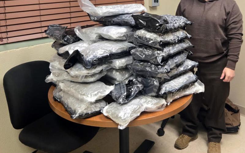 GARZA DRUG ARREST Deputy Mike Martinez took in more than 80 pounds of marijuana seized following a Dec. 13 traffic stop in Post, Texas, marking a significant drug bust for the Garza County Sheriff’s Office. | COURTESY PHOTO