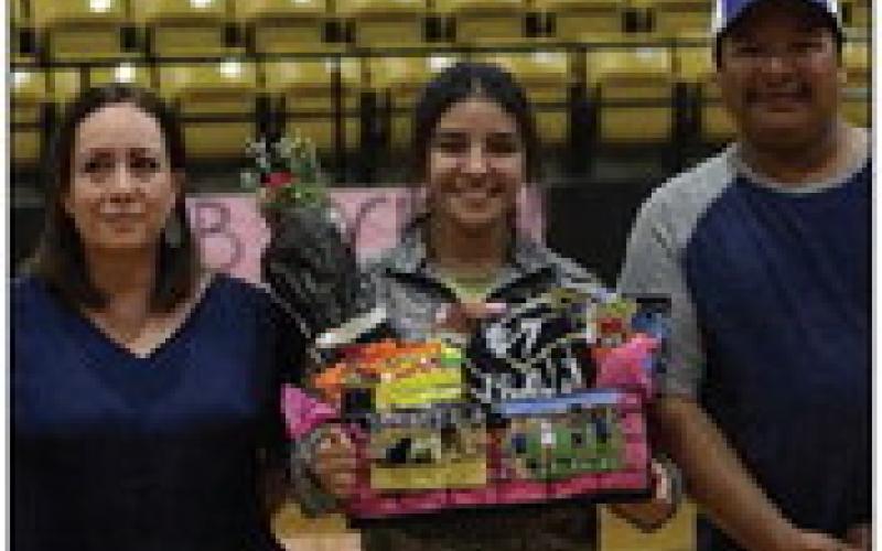 Chelsy Rodriguez escorted by parents: SanJuana and Hector Rodriguez