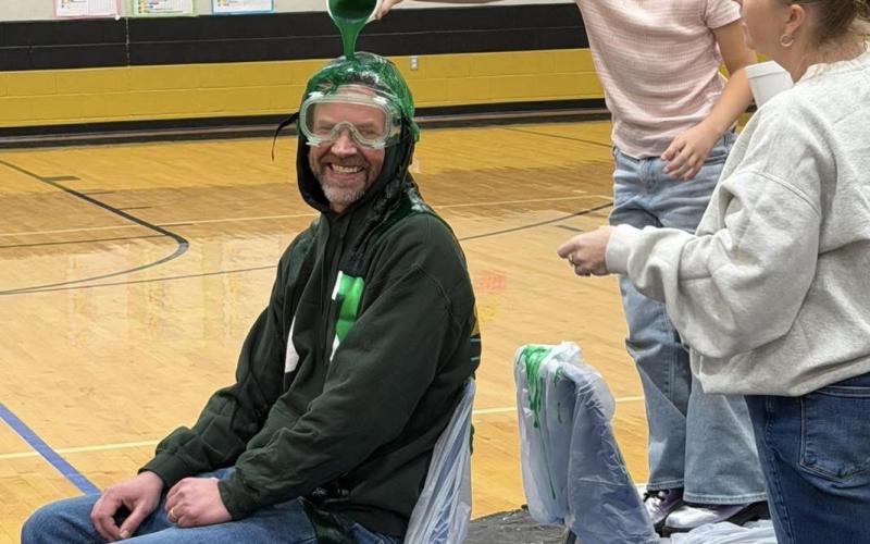 SLIMING THE TEACHER! Social Studies teacher Mr. Schaefer was slimed as students watched during the Kids Heart Challenge celebration. | COURTESY PHOTO