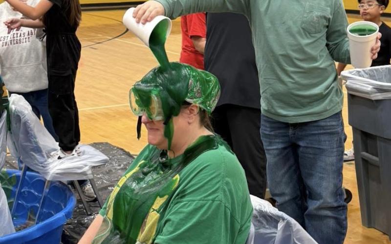 SLIME WHERE IT COUNTS Math teacher Ms. Baker was a slime target too—all in good fun. | COURTESY PHOTO