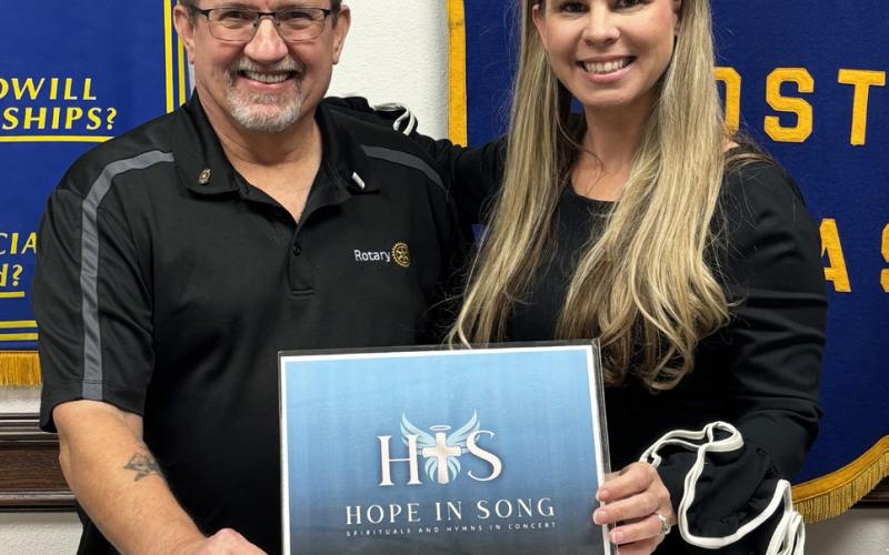 HOPE IN SONG Rotarian Chris Atkinson pictured with guest speaker and performer Amanda Key, following her presentation about her nonprofit and her journey of recovery at a recent Rotary meeting. | COURTESY PHOTO