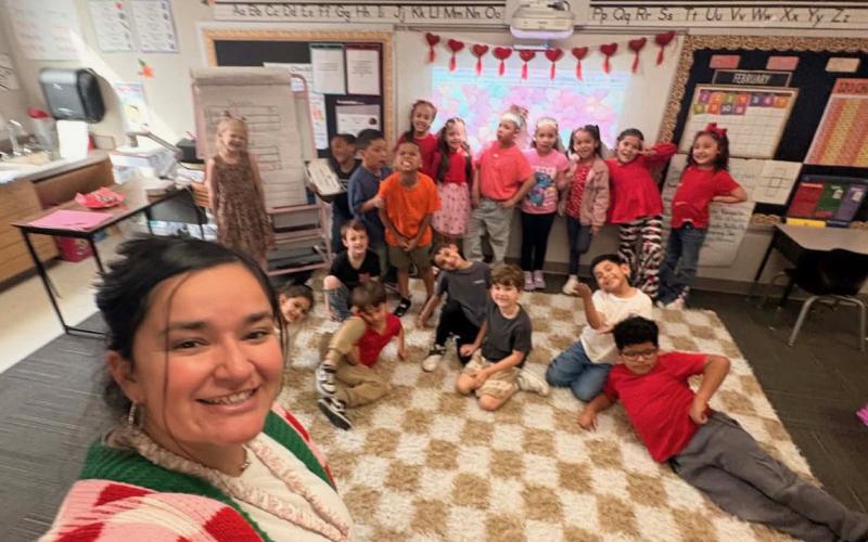 FRIENDSHIP AND FUN Kindergarten and first-grade students at Post Elementary celebrate Valentine’s Day, as families joined the festivities. | COURTESY PHOTOS