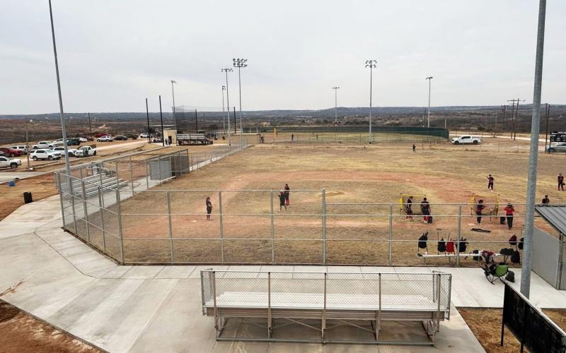 FIELD FIXUPS Improvements to Post’s baseball field complex were made possible by a Post Rotary Club donation, proving that more than monetary support goes a long way. | COURTESY PHOTOS
