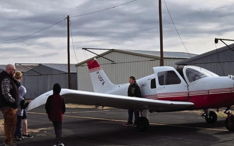 LITTLE AIRPLANE Jarle Bø pulled his private airplane from the hangar to host the Post Rotary Club during their spring social, Thursday, April 3. | COURTESY PHOTO