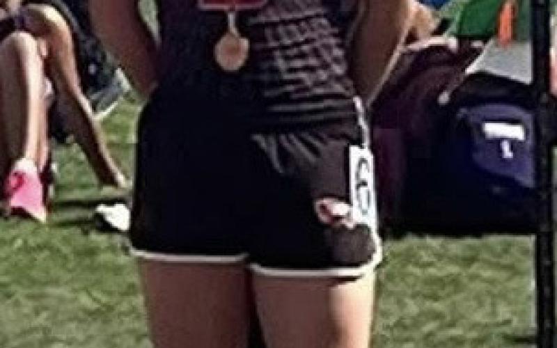 DISTANCE QUALIFIER Kyleen Garcia advances to the 1A Region 1 track meet after placing third in the 3200-meter run and fourth in the 1600-meter run at the area meet. | COURTESY PHOTO