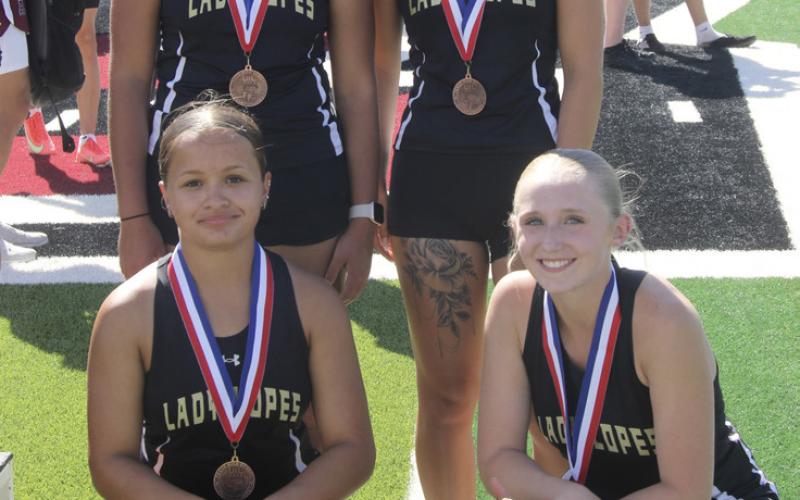RIGHT LADY LOPES QUALIFY Adriana Rangel, Hayleigh Parker, Harley Rivera and Karmon Mullins after receiving their medals, finishing fourth in the 4x100-meter relay at the area meet to qualify for the Region 1-2A Track Meet. | MINGO SOTO