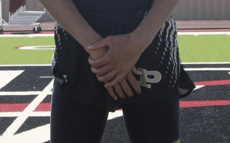 SPRINT SILVER Sean Ramos, after receiving his secondplace medal, finished second in the 200-meter dash at the area meet to qualify for the Region 1-2A Track Meet. | MINGO SOTO