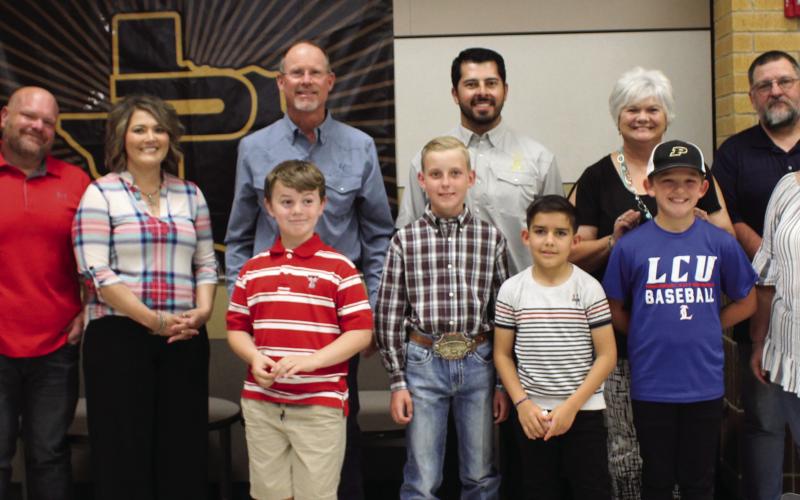 Post ISD School Board honored the students and teachers of the month for April and May. Front row from left to right are Charles Valner, 2nd grade for May, Carson Petty, 5th grade for April, Rodrigo Hernandez Lara, 4th grade for May, Kye Baker, 5th grade for May, and teacher LaNita Lafon. Back row are the trustees, Jett Lott, Joe Don Schoonover, Amy Guthrie, teacher for April, Drew Kirkpatrick, Kris Hernandez, Nancy McDonald, Rick Tadlock, and Chelsey Webb.