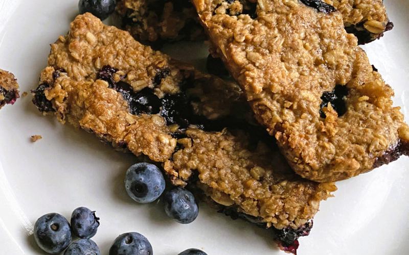 HOMEMADE GRANOLA BARS are a healthier, customizable alternative to store-bought options that often contain unhealthy oils, sugars, and artificial ingredients, despite their marketed image as nutritious snacks; by controlling ingredients like nuts, oats, fruits and natural sweeteners such as maple syrup, you ensure a nourishing, fresh, and tasty treat perfect for breakfast, snacks or lunchboxes, all while avoiding the junk food masquerading as health food in many commercial products. | ANGELINA LARUE PHOTO