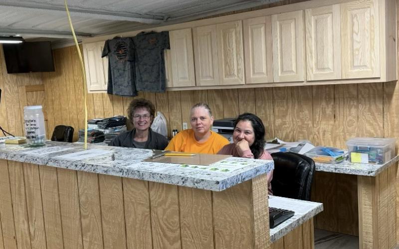 Marci Oden, Lichelle Hudman and Angelia Johnson are behind the scenes making the event possible.