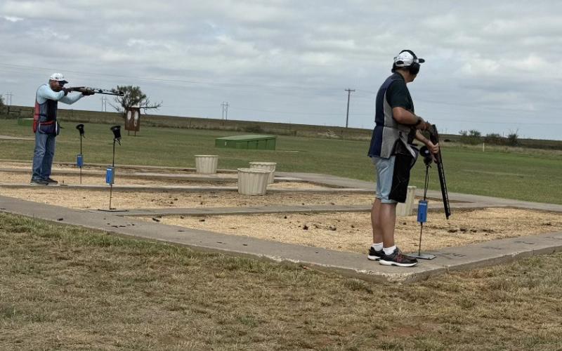 Two of our annual shooters shooting handicap.