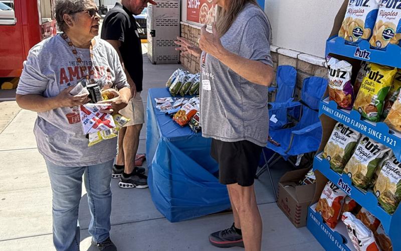 VENDOR BOOTHS Customers sampled wares from vendor booths during the Casey’s grand opening in Post April 15. | STEPHANIE ALLEN