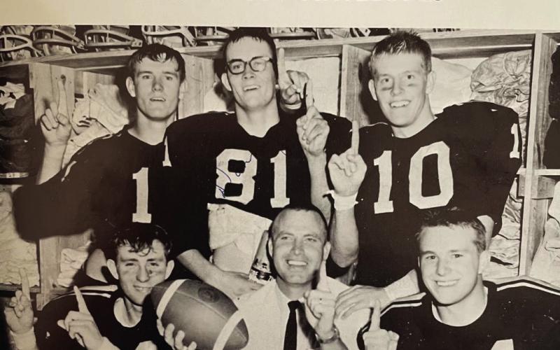 Antelopes celebrate after the win over D City. With Coach Glynn Gregg are Davis Heaton, Donny Windham, Dick Kennedy, Jimmie Bartlett and Paul Walker.
