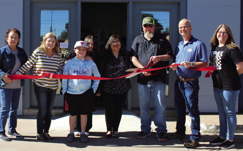 RIBBONCUTTING Post Area Chamber of Commerce ribbon cutting at the Bait Shop included Linda Alaniz, Susan McDonald, the Britton family - Dakota, Caycee, Raquel, and Randy cutting the ribbon, Clay Miller and Ashley Hawkins., STAFF PHOTO