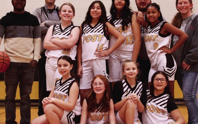 Girls 5th/6th Coaches Sheldon Gray, Carson Windham, Sponsor WinCo, and players Desirae Bell, Halle Guthrie, Macie Hiracheta, Gabriela Hernandez, Annabella Graves, Kinley Gomez, Riley Riedel, and Charlotte (Charley) Windham. | WHITNEY DORSETT PHOTO
