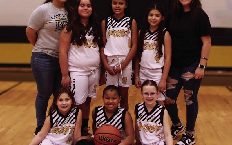 Girls 3rd/4th Coaches Aracely Soto &amp;amp; Keila Rodriguez, Sponsor Thompson Wrecker Service, and players Kahla Coghill, Eva Jo Grizzell, Linkyn Jeffrey, Adela Contreras, Dezariyah Spann, Brooklyn Collins, and Jaelynn Soto. | WHITNEY DORSETT PHOTO