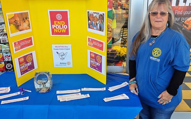 POST ROTARY Pam Atkinson volunteered at the Rotary Club table outside the United Supermarket Oct. 26. The club is raising funds to help eradicate polio, the national clubs’ focus. For every dollar raised, a child receives a vaccination. Post Rotary aims to raise $1,000 by mid-November. Atkinson says they raised $225 and some change in the four hours they were there. | COURTESY PHOTO