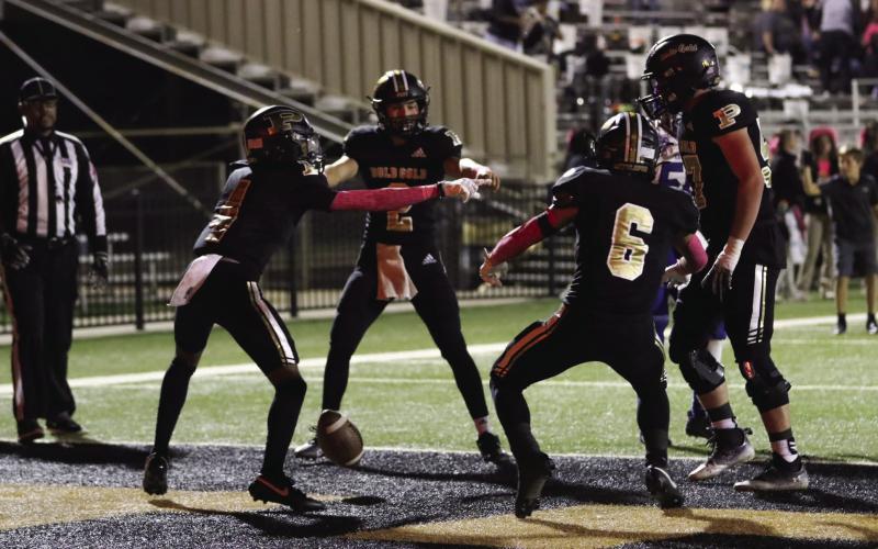 Antelopes celebrate in the end zone. | ABIGAIL RODRIGUEZ PHOTOS