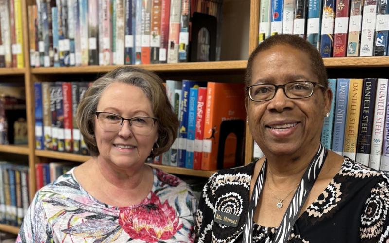 LIBRARIANS Pam Humble (left) and assistant Kathy Manuel are our incredible librarians at the Post Public Library. Stop in to purchase a book from their super large sale. | STAFF PHOTO