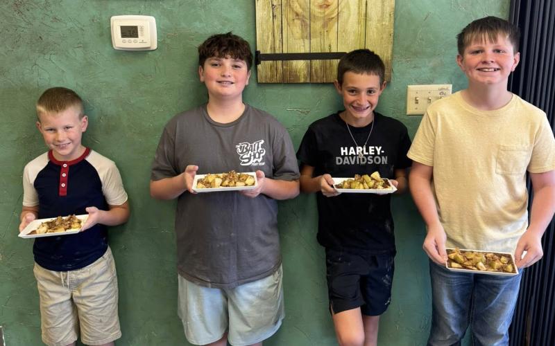 FOOD CHALLENGE Garza County 4-H offers an array of classes for its members, including the Food Challenge. Members learn nutrition facts, diet portions and practice building a visually appealing plate. Challengers, from left, were Connor Griffin, Cooper Britton, Bryson Bloomingdale and Aaron Brooks. | COURTESY PHOTO