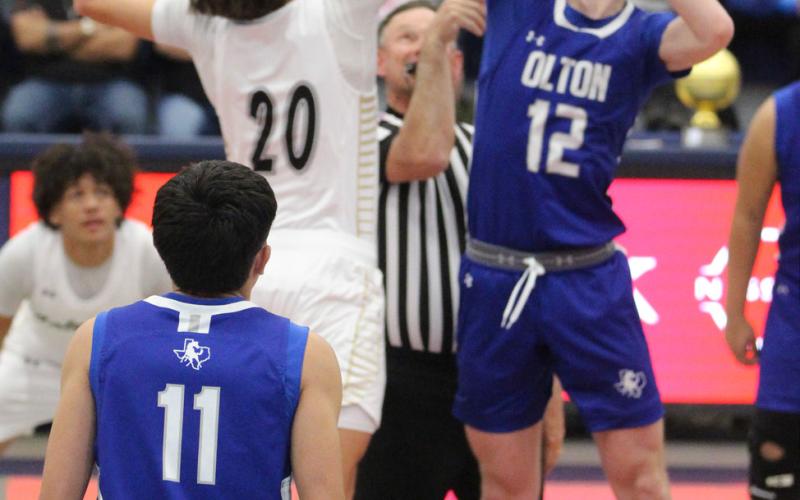 TIP-OFF Players from Post and Olton leap for the opening jump ball. Olton went on to defeat the Bold Gold Antelopes 70-31 on Tuesday, Feb. 24, at Lubbock-Cooper Liberty High School. | POST YEARBOOK