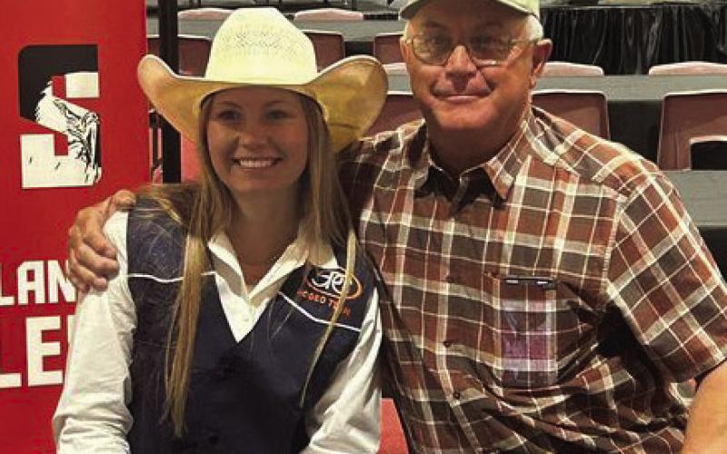 SPC RODEO Sylee Peterson of Southland High School has signed a letter of intent to rodeo at South Plains College in Levelland. Shown with Sylee is her dad, Paul Peterson. | COURTESY PHOTO