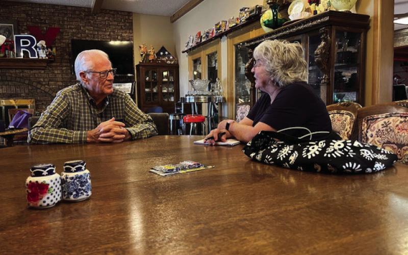 REV. HAROLD HARRISON (left) describes his journey of faith to columnist Sue Jane Sullivan. | COURTESY PHOTO