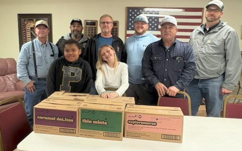 IN APPRECIATION Dezariyah Spann and Averie Howell delivered Girl Scout cookies to members of the Post Fire Department, including FD3 Barry Morris, Vice President Paul Perez, Assistant Chief and Secretary-Treasurer Darrell Reece, Firefighter Blaine Reece, FD2 Michael Cole and Fire Chief FD1 Jimmy Valdez, in recognition of their service. | COURTESY PHOTO