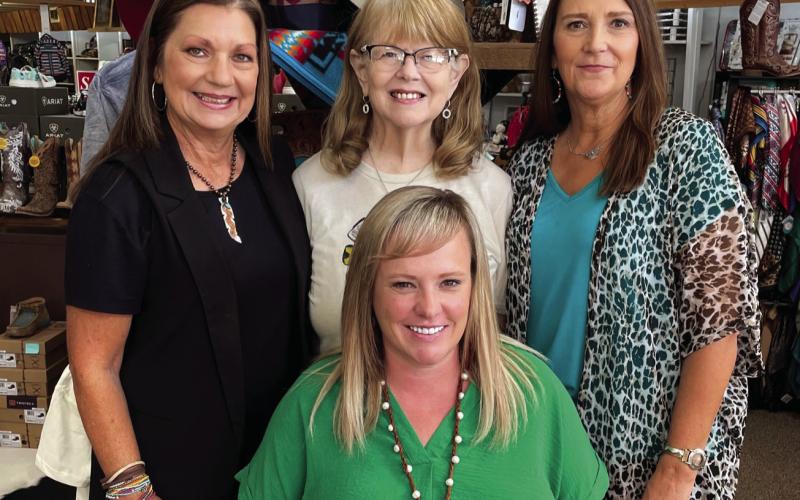 The staff of KD’S Korral are Donna Smith, Jaynie Dickson, and Vicki Gray. Seating is the owner Kim Aten.