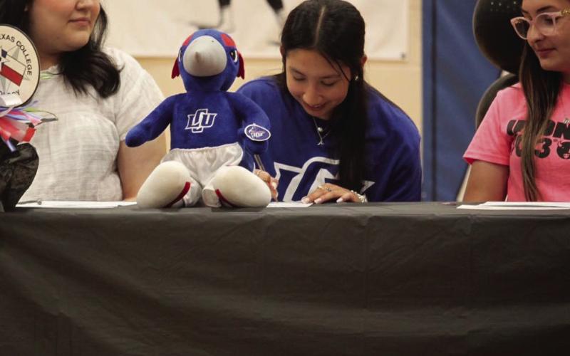 LCU Abigail Rodriguez signed her letter of intent with Lubbock Christian University where she will pursue a Bachelor of Science degree in Nursing. Looking on as she signs are Zoey Pequeno and Madeline Soria. | COURTESY PHOTO