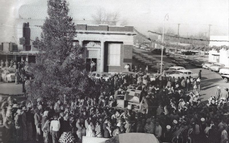Crowds gather for the lighting of the live Christmas tree in the 1960’s in downtown Post. The tree will be lighted then Santa will arrive. Kid will be looking for him everywhere, even from the sky, maybe. Courtesy Photo