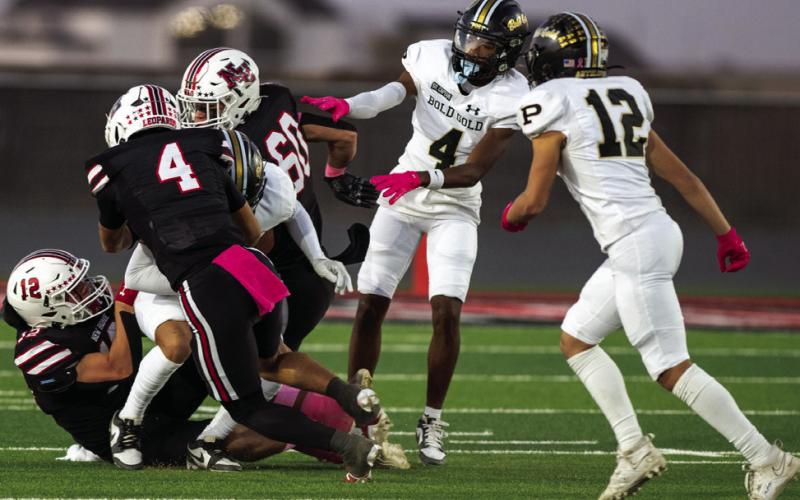 TRIUMPHANT ANTELOPES Post Bold Gold triumphantly win their third district game against New Home 27-20. | RON FRANCIS PHOTO