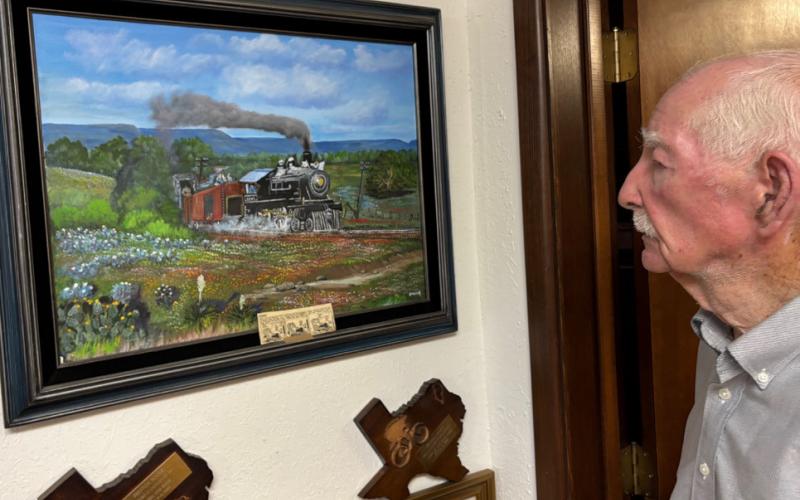REMINISCING An oil painting reminds Preston Poole of a good youthful adventure before he decided to become an attorney. | PAULA JACKSON PHOTO