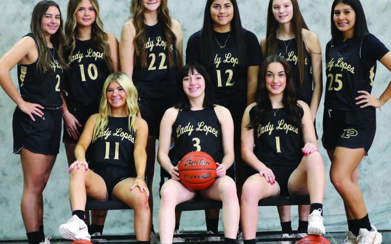 The 2023 Lady Lopes Varsity Basketball includes front row Macy Gilliland -Jr., Kaylie Zapert – Sr., and Adriana Rangel – Jr. Back row Karmon Mullins – So., Jaruda Schroth - So, Shaylee Pope- Jr., Nevaya Segura – Jr., Ryleigh Matus – Fr., and Serenity Sanchez- So. The Head Coach is David Jeffrey, assisted by Stevie Matus and Levi Groomer. | ABIGAIL RODRIGUEZ PHOTO