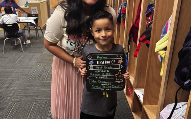 Ayden is with his first-grade teacher, Mrs. Cruz; Ayden wants to be an ocean scuba diver. Good luck in first grade!