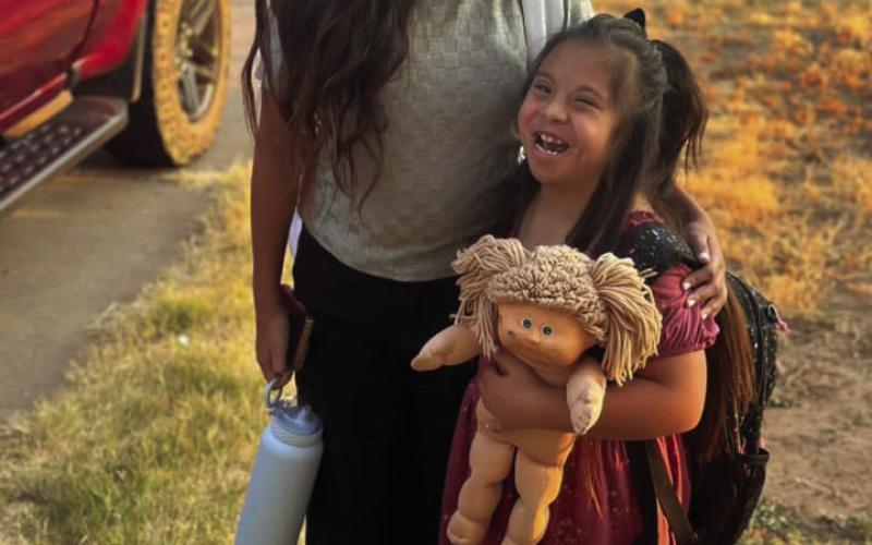 Sisters Kinley and Khole Gomez are ready to get to school, but they must stop for mom Kim to take the first-day school photo. Kinley is a sixth grader and Khole will started second grade. | COURTESY PHOTO