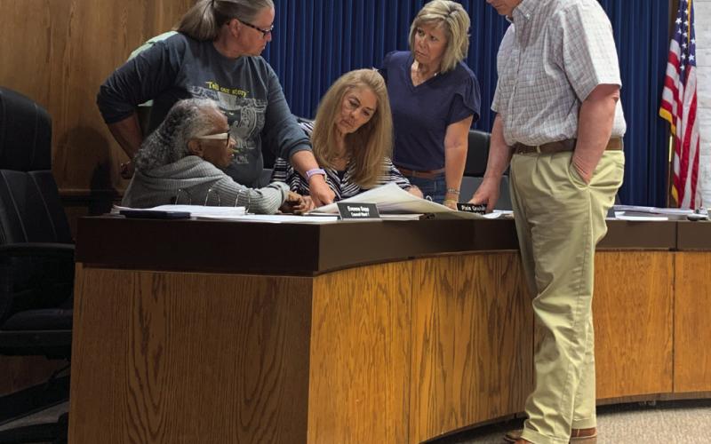 MAP ZONES City council members point out the industrial zone on the city map during the discussion to approve a new ordinance during the last council meeting on April 15. | ANNA GIBSON PHOTO