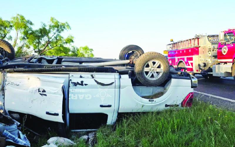 COLLISION ENDS CHASE Garza County Sheriff Michael Isbell brings a high-speed chase to a halt near Post on Wednesday, May 21. The pursuit, which began in Big Spring, ended with both vehicles in a rollover collision. Isbell confirmed he is doing well following the incident, and the suspect was taken into custody at the scene. | COURTESY PHOTO