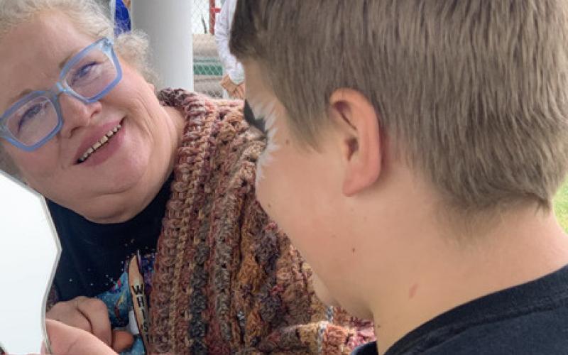 FACE PAINTING Gianna Martin-age 4, was the first to have her face painted at the Post Methodist Church Praise in the Park event Saturday. | PAULA JACKSON PHOTOS