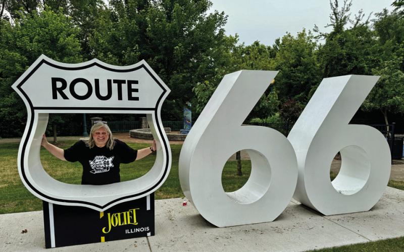 WISH YOU WERE HERE Postcard and photo props—like this one in Joliet, Illinois—abound all along the 2,448 miles of historic Route 66 from Chicago to Los Angeles. | NEWSPAPER PHOTO
