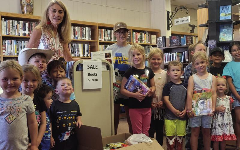 The Post Public Library Summer Reading program ended last week. The kids are presenting Pixie Grisham with boxes of food collected for Post Cares. The library took in cans of food with overdue books along with fines forgiven. Librarian Pam Humble said the food drive was a success. PHOTO PROVIDED