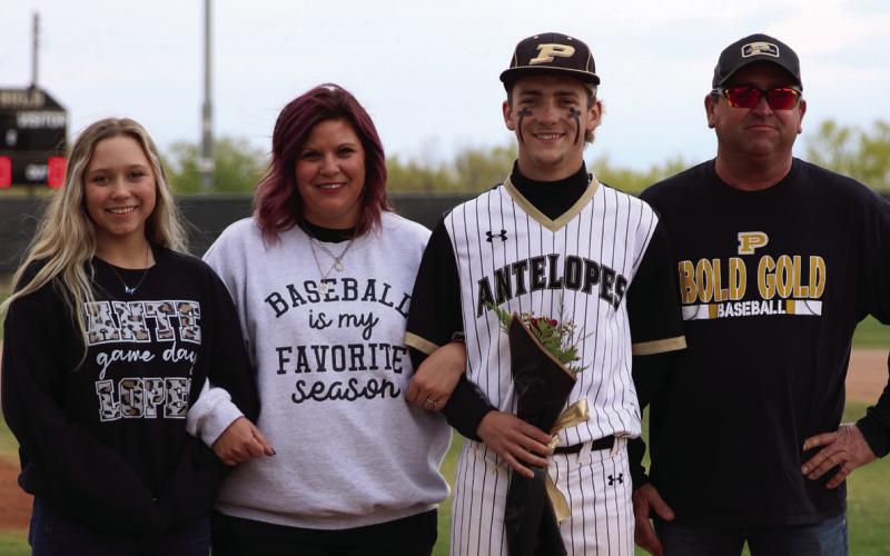 Jacob McClellan escorted by: Samantha, Michael and Harli McClellan