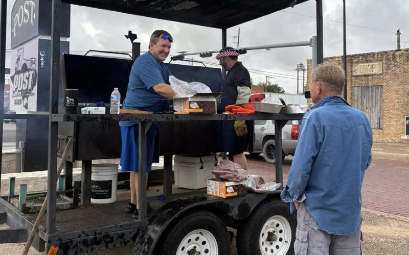 ROTARY FUNDRAISER The Post Rotary Club held a fundraiser in downtown Post on Tuesday, cooking and selling burgers and sausage wraps on 84 and Main to help raise funds for the downtown beautification project. | COURTESY PHOTO