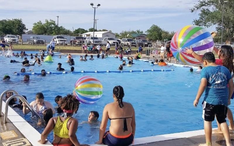 COMMUNITY SPLASH Children and families get a chance to cool off during a Community Recovery Center pool party at the Post Community Pool, coming up June 9 (pictured here, from 2017’s event). | COURTESY PHOTO