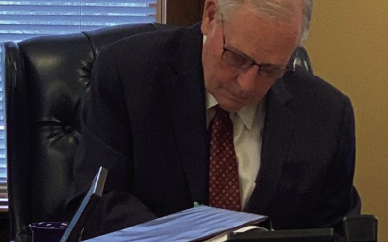 SYDAPTIC UPGRADE During a special called commissioners’ meeting, Thursday, Sept. 26, Judge Lee Norman voted in favor of moving forward with the $2.8 million security upgrades through Sydaptic. Inc. at the Giles W. Dalby facility. | ANNA GIBSON PHOTO