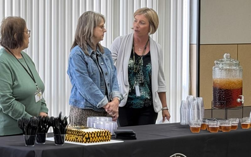 RETIREMENT TRIBUTE Post ISD Superintendent Cassie Petty (right) congratulated retirees Irene Abraham (left) and Mary Short (middle) during a retirement celebration honoring their combined years of service to the district on May 21 at the Post High School Commons. | STEPHANIE ALLEN