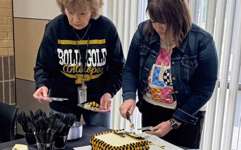 COMMUNITY CELEBRATION Guests attending the retirement reception for Irene Abraham and Mary Short enjoyed refreshments and fellowship during the May 21 celebration honoring the retirees’ combined 66 years of service. | POST DISPATCH